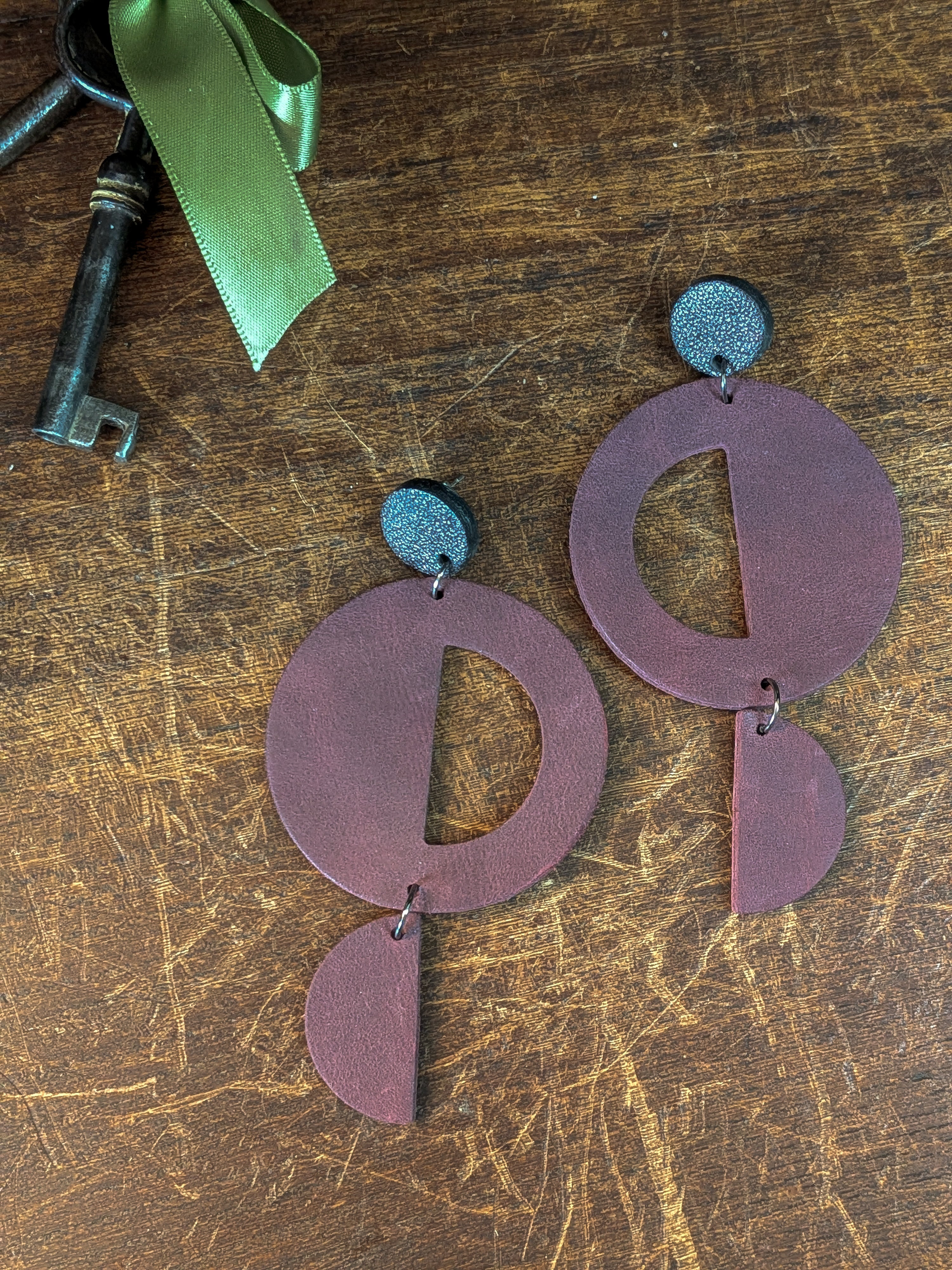 The Minimalist Peak | Bordeaux Geometric Leather Studs