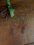 The Archer Muse | Asymmetric Cognac & Dark Chocolate Hooks